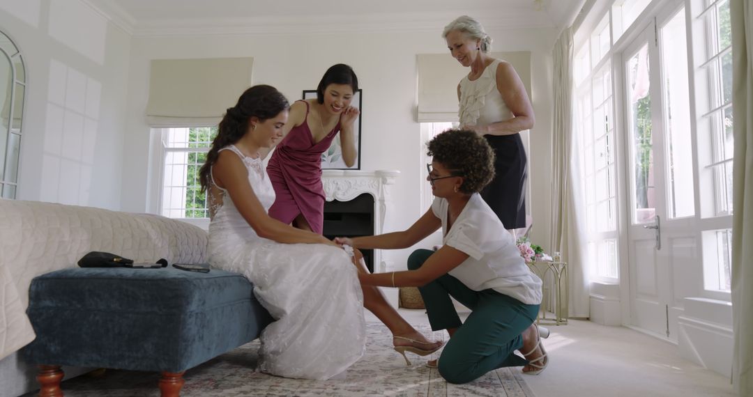 Bride Getting Ready with Bridesmaids and Family in Chic Room