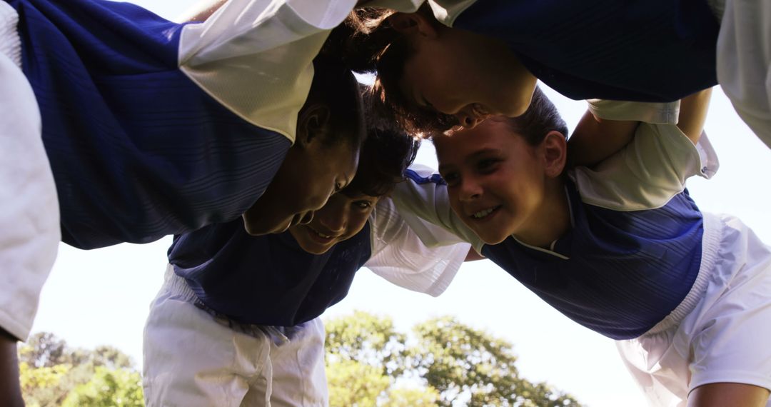 Youth Soccer Team Encouraging Each Other During Huddle - Free Images, Stock Photos and Pictures on Pikwizard.com