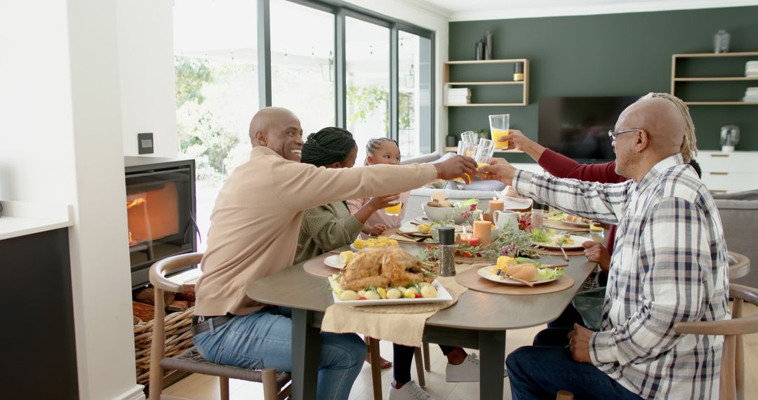 Happy African American Family Enjoying Holiday Meal Together - Free Images, Stock Photos and Pictures on Pikwizard.com