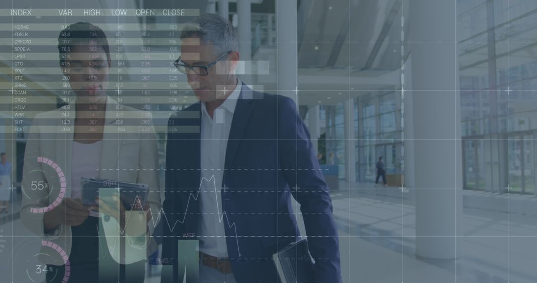 Business Professionals Analyzing Financial Data on Digital Interface