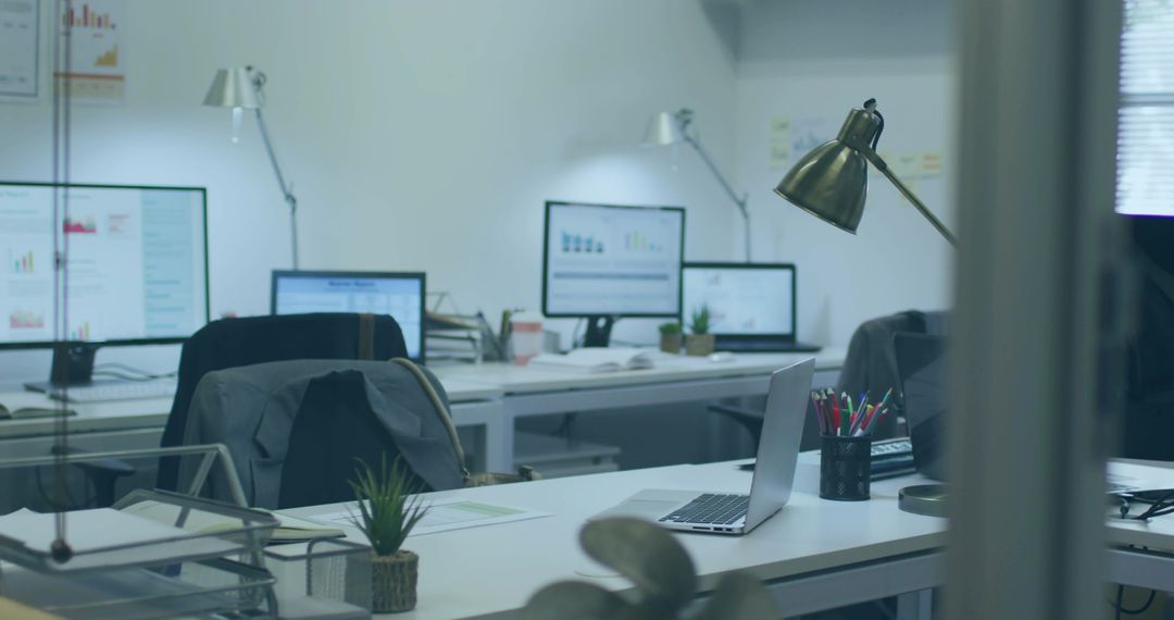 Modern Open Workspace with Laptop and Personalized Decor