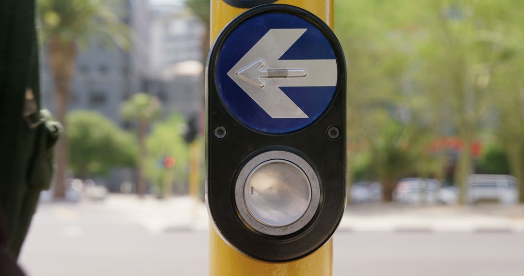 Close-Up of Pedestrian Crossing Button with Arrow in Urban Setting - Free Images, Stock Photos and Pictures on Pikwizard.com