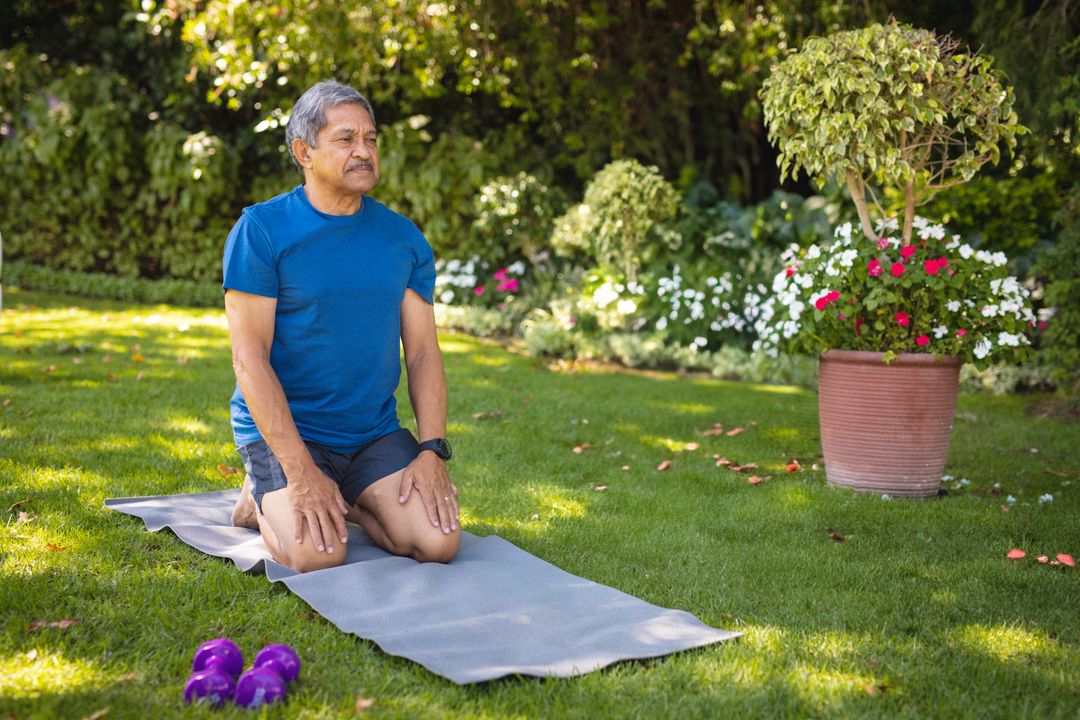 Senior Man Meditating in a Serene Garden Setting