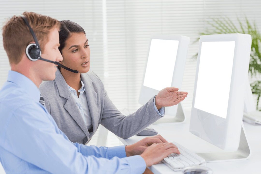 Office Team Collaborating on Transparent Project with Computers - Download Free Stock Images Pikwizard.com