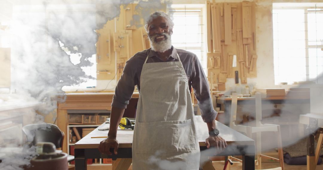 Smiling Carpenter Posing Proudly in Woodworking Workshop