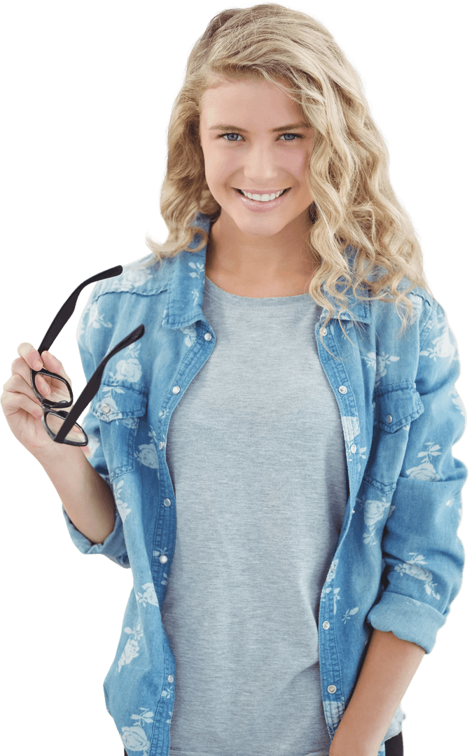 Smiling Woman Holding Transparent Eyeglasses in Office
