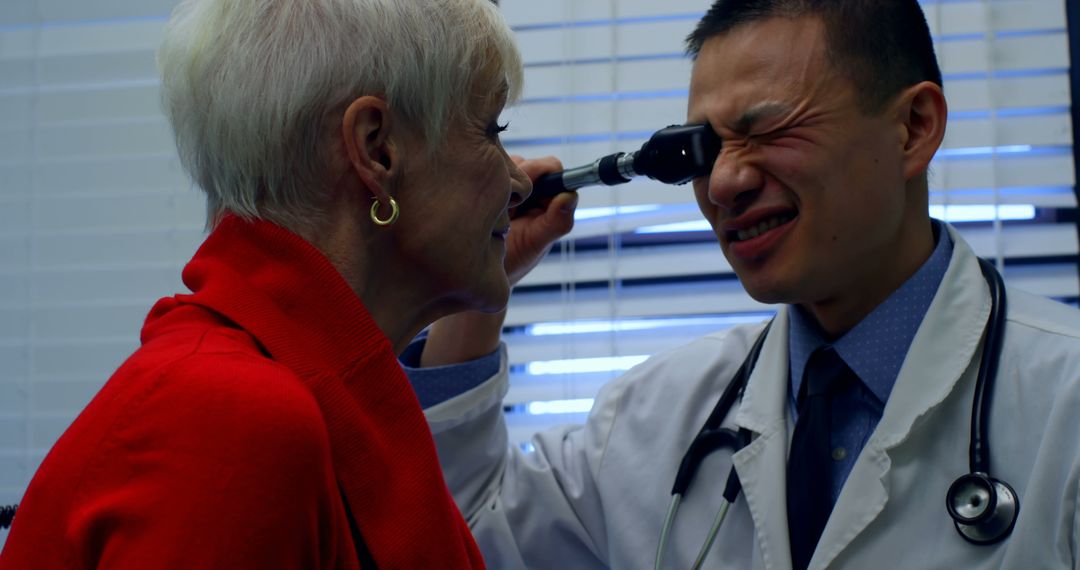 Doctor Examining Senior Woman with Otoscope in Medical Clinic - Free Images, Stock Photos and Pictures on Pikwizard.com