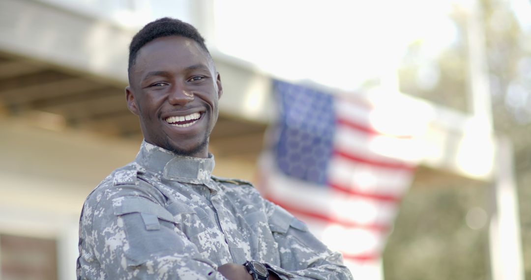 Smiling African American Soldier in Front of American Flag - Free Images, Stock Photos and Pictures on Pikwizard.com