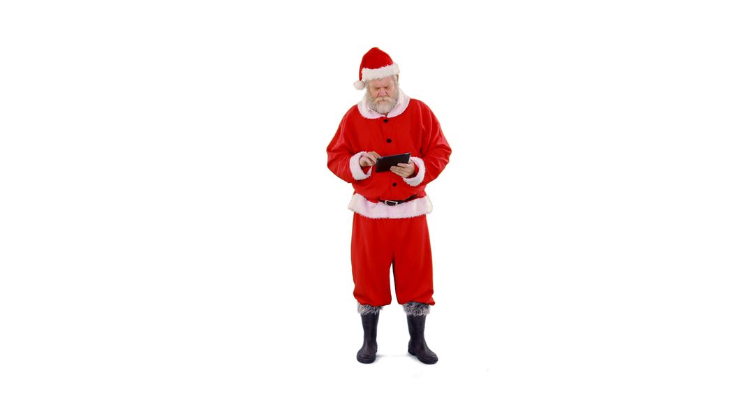 Santa Claus Using Digital Tablet While Standing Against White Background - Free Images, Stock Photos and Pictures on Pikwizard.com