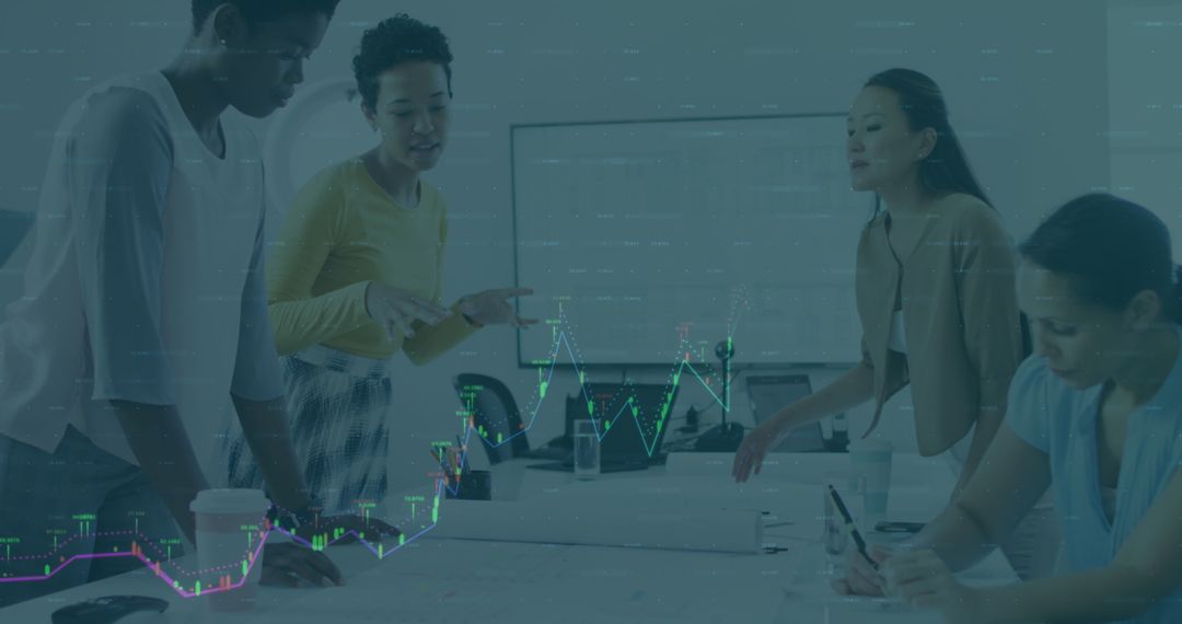 Diverse Team Analyzing Data and Financial Trends in Modern Office