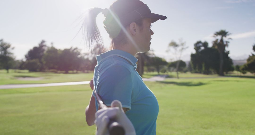 Female Golfer Warming Up On Golf Course at Sunrise - Free Images, Stock Photos and Pictures on Pikwizard.com