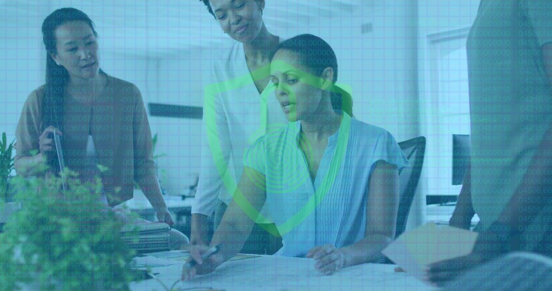 Diverse Team Discussing Cybersecurity Strategies in Modern Office