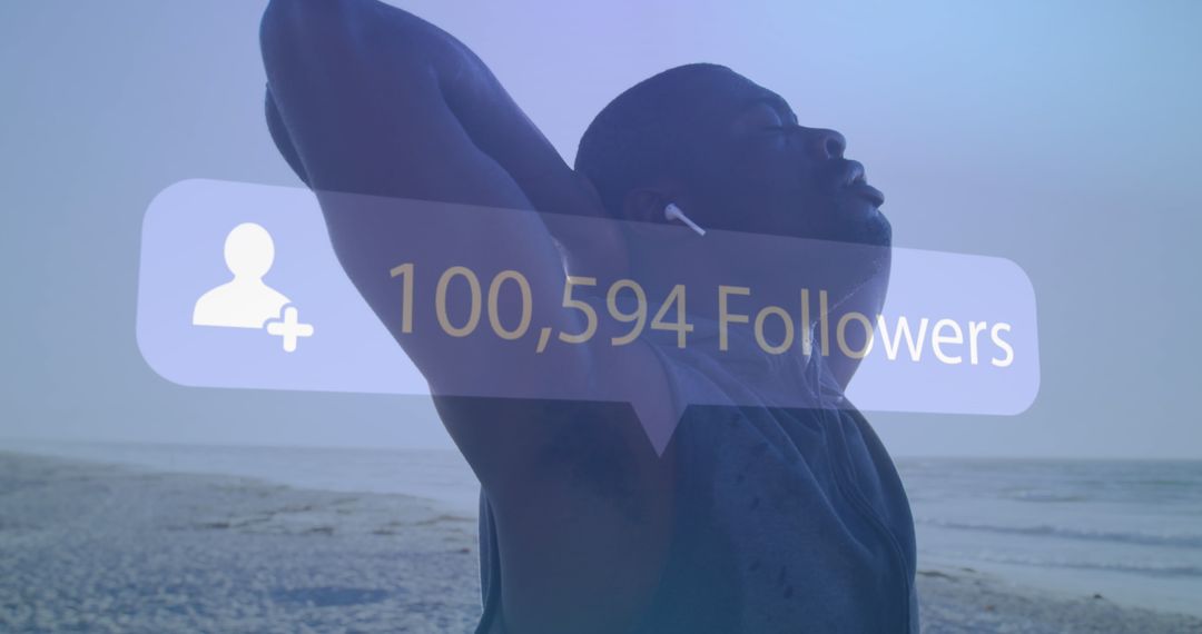Silhouette of Man Stretching on Beach with Social Media Overlay