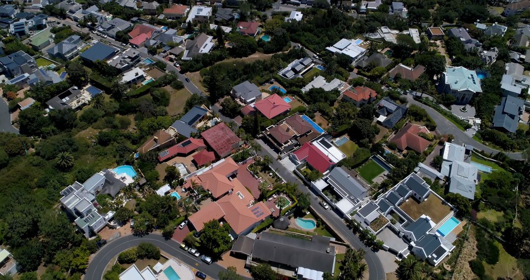 Aerial View of Suburban Neighborhood with Greenery and Streets