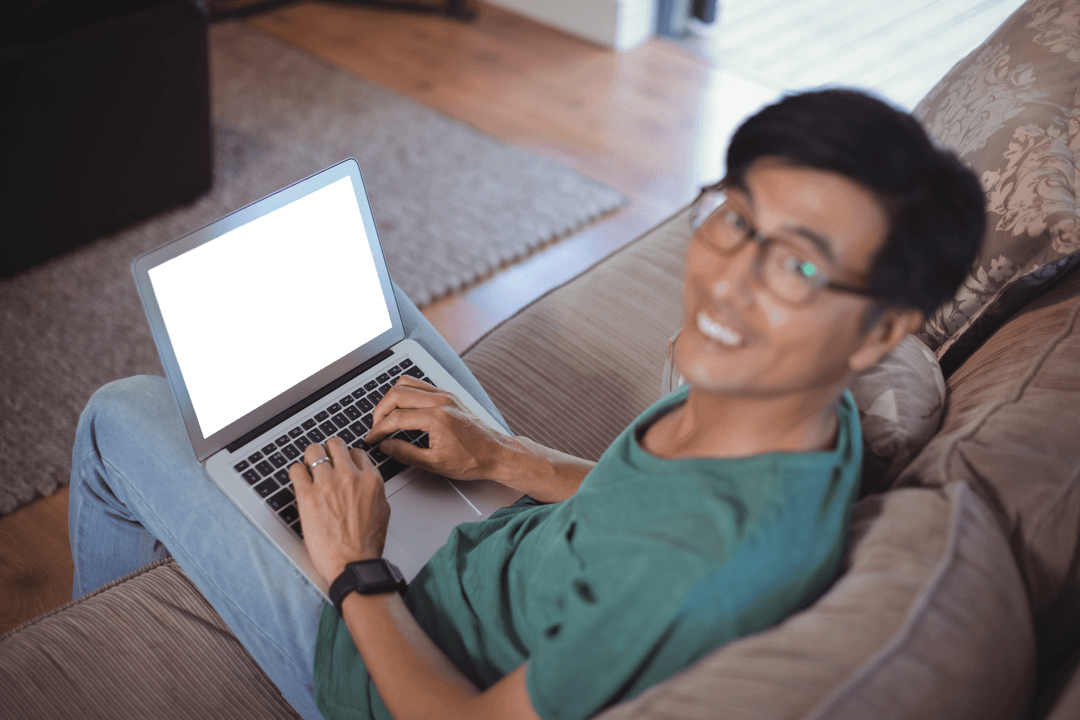 Transparent Laptop on Sofa Comfortable Home Setting