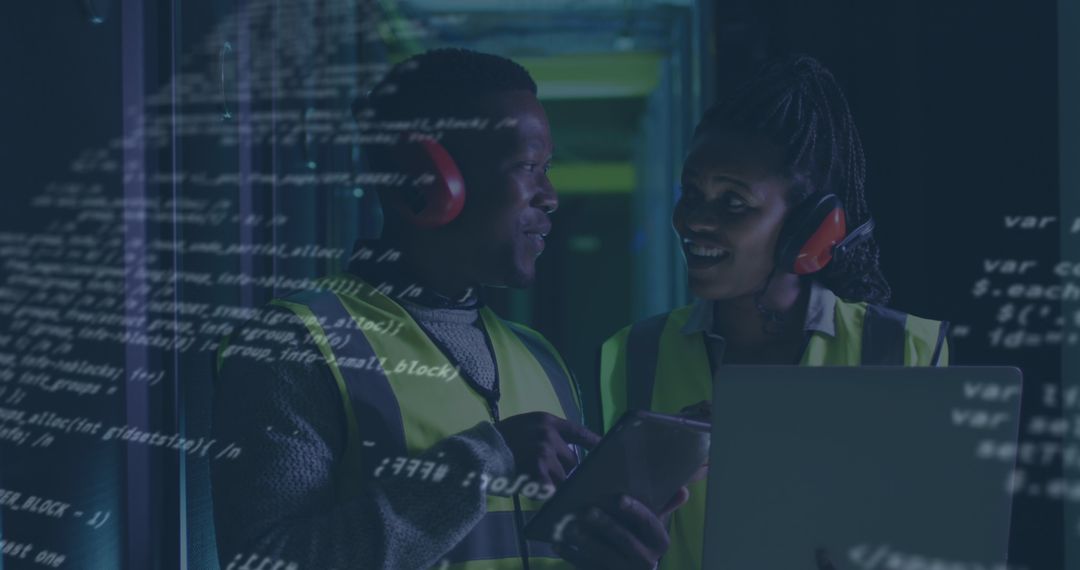 African American Technicians Managing Server in Data Center