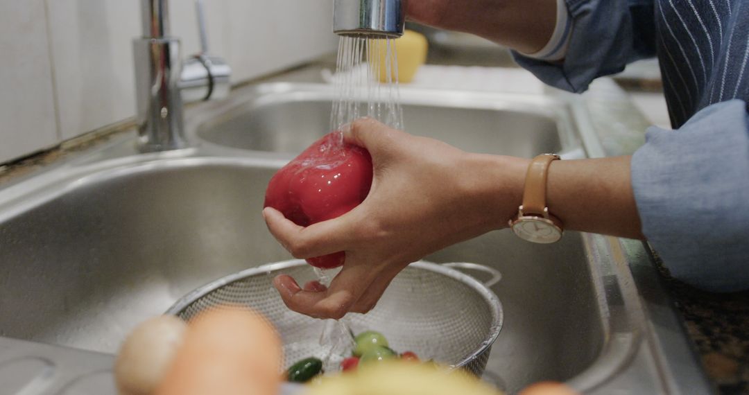 Woman Washing Fresh Vegetables in Kitchen Sink - Free Images, Stock Photos and Pictures on Pikwizard.com