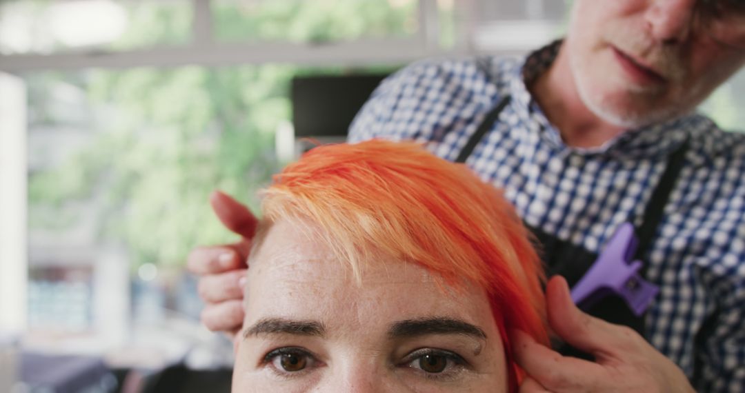 Hairdresser Coloring Woman's Hair with Bright Orange Dye in Salon - Free Images, Stock Photos and Pictures on Pikwizard.com