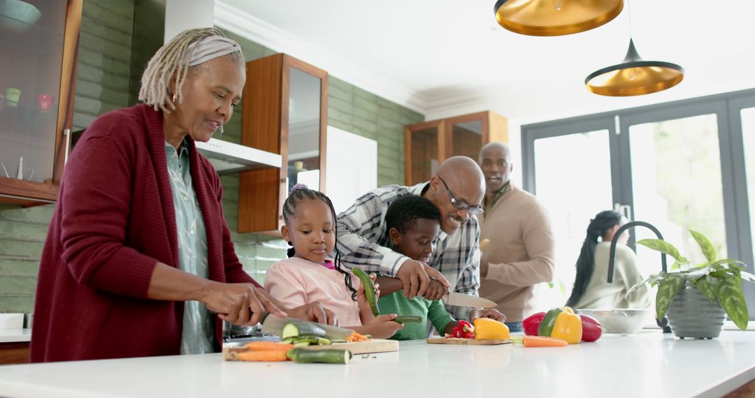 Multigenerational African American Family Preparing Meal Together in Kitchen - Free Images, Stock Photos and Pictures on Pikwizard.com