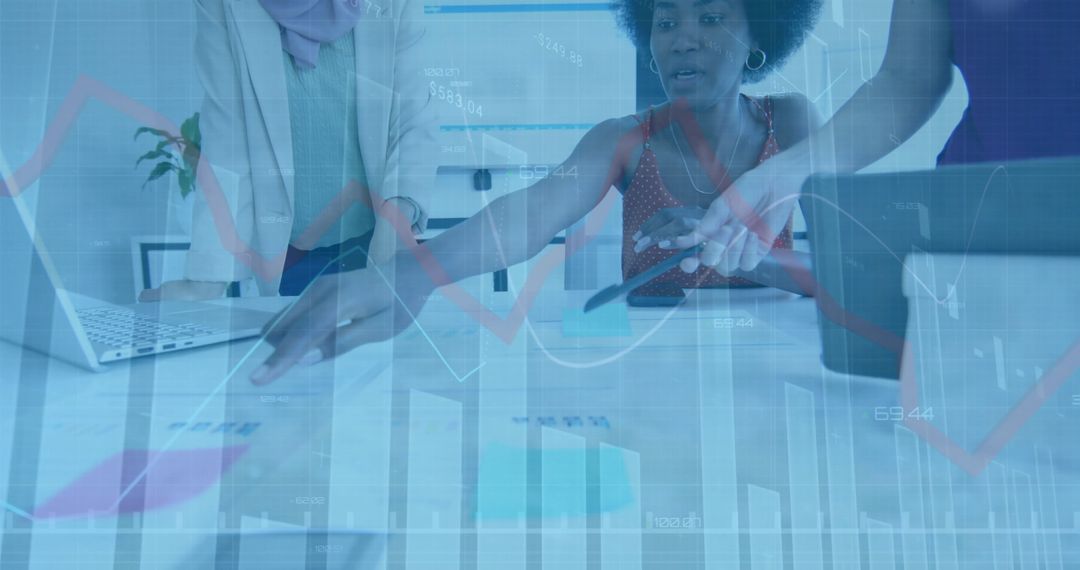 Diverse Business Professionals Analyzing Data for Strategic Insights