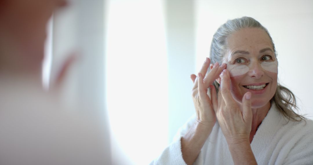 Mature Woman Using Under-Eye Patches in Morning Skincare Routine