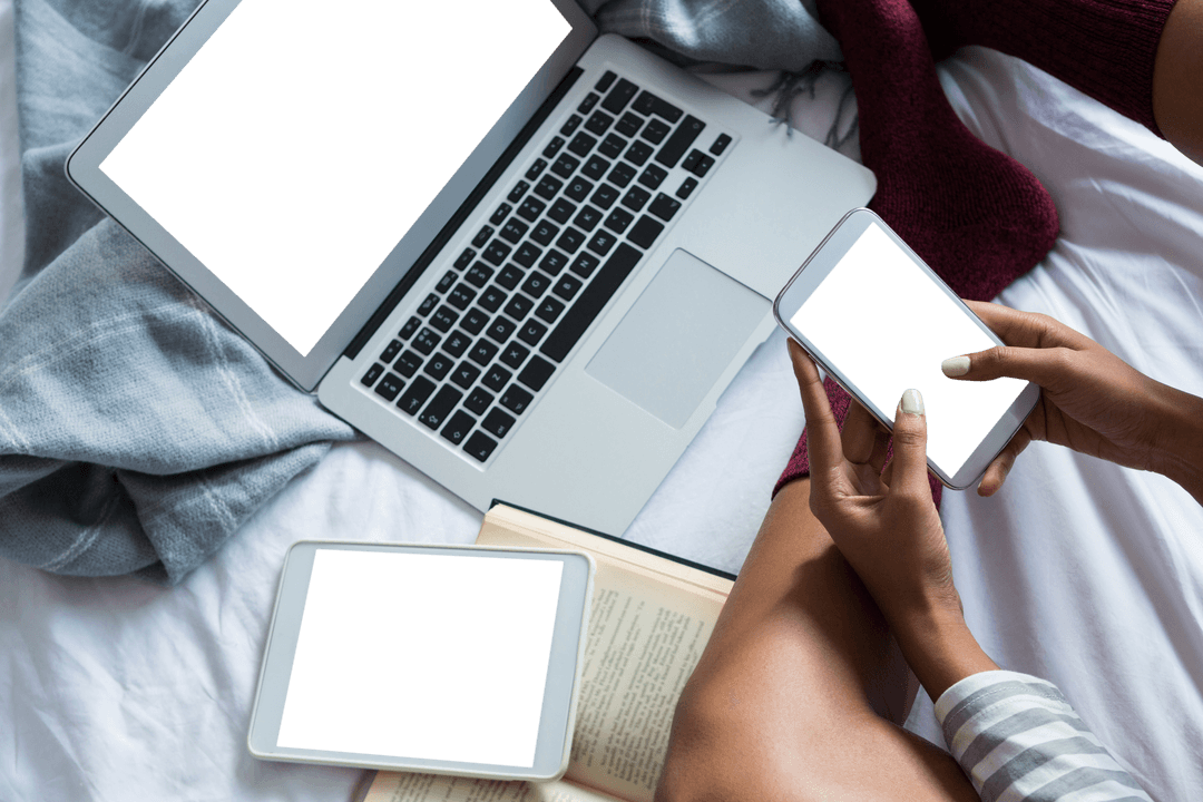 Transparent Devices Used by Woman Relaxing on Bed at Home