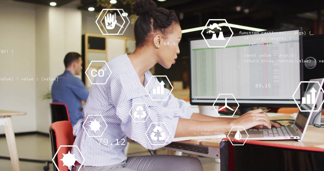 Diverse Colleagues Analyzing Data with Media Icons in Modern Office