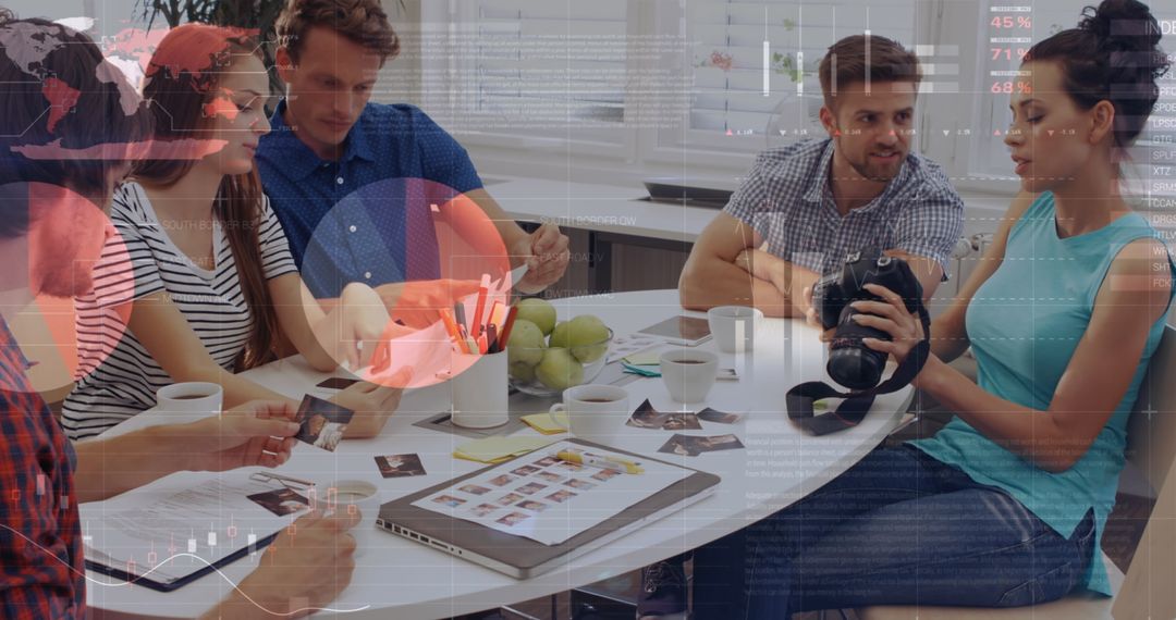 Diverse Colleagues Collaborating in Office with Data Overlay
