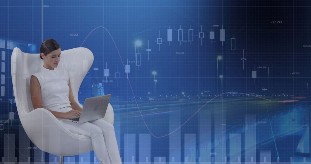 Focused Woman Analyzing Data on Laptop with Financial Charts