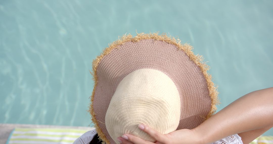 Relaxing by Refreshing Swimming Pool in Stylish Sunhat