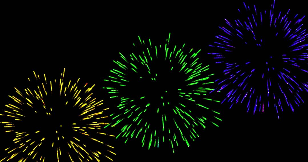 Colorful Festive Fireworks Exploding Against Black Background
