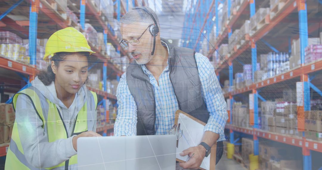Warehouse Workers Analyzing Digital Inventory Data
