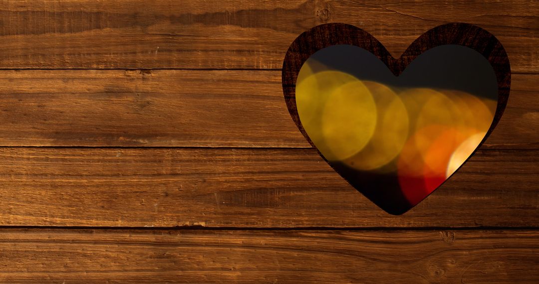 Glowing Heart Bokeh Through Wooden Cutout