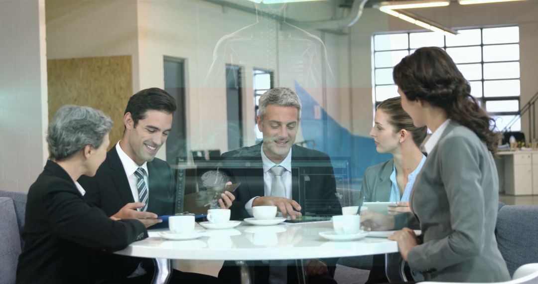 Business Team Analyzing Holographic Skeletal Display in Modern Office