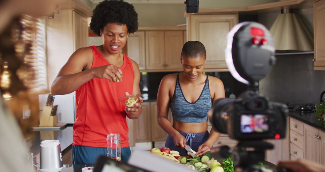 Friends Creating Cooking Vlog in Modern Kitchen Setting