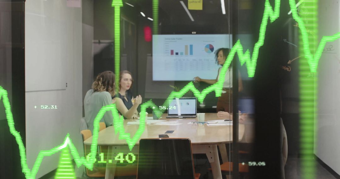 Modern Business Team Analyzing Data with Digital Graphs