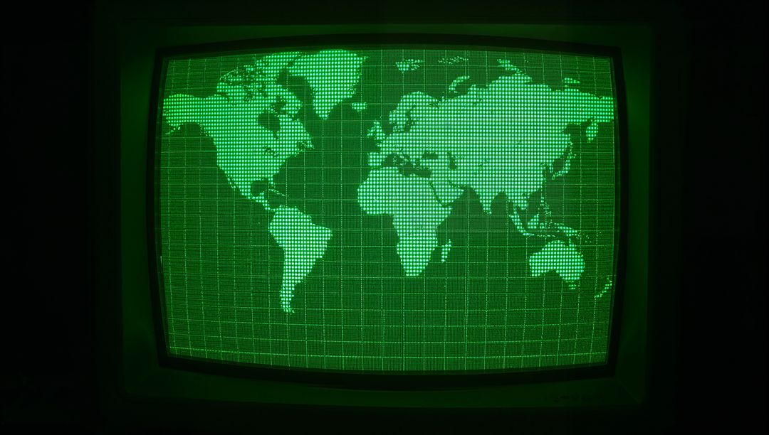 Retro CRT Display with Green World Map in Technological Environment