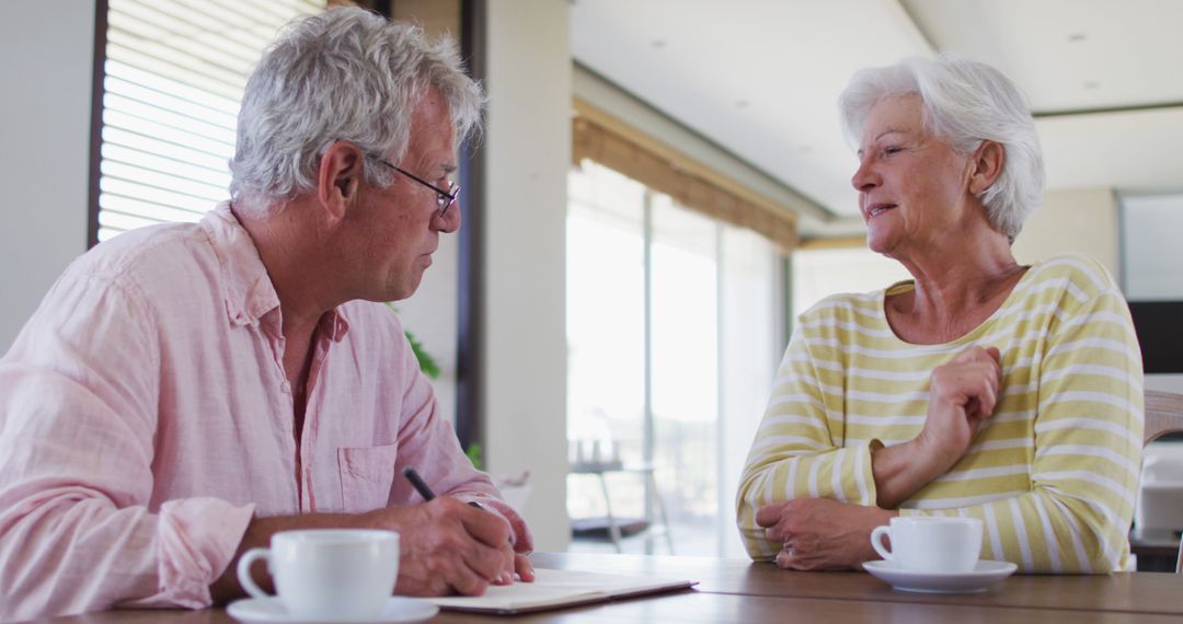Senior Couple Discussing Finances at Home