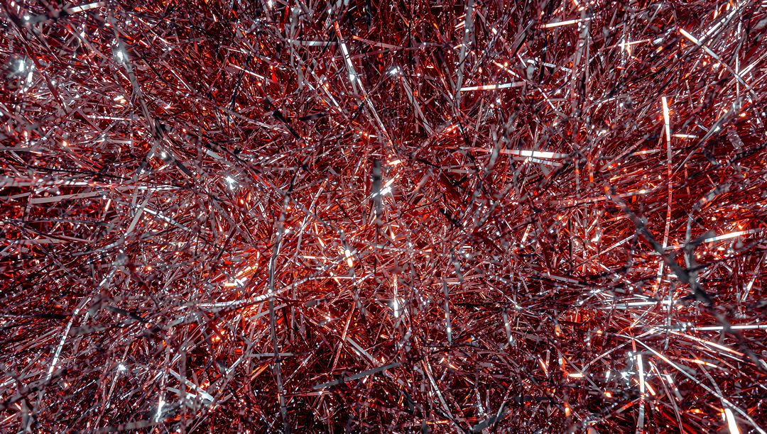 Red Metallic Tinsel Macro Sparkling Texture with Foil Strands and Glitter Shine