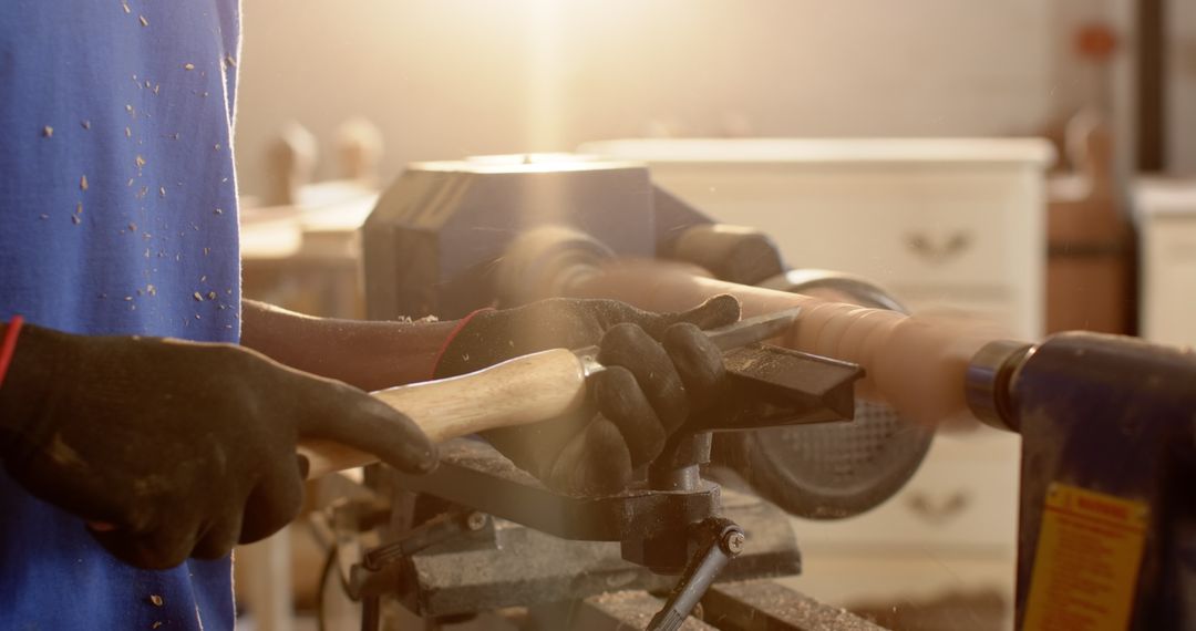 Woodworker Crafting on Lathe in Sunlit Workshop
