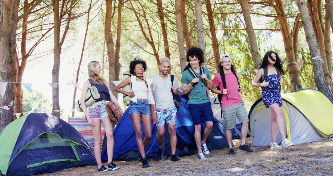 Young Adults Enjoying Camping Trip in Forest, Embracing Nature - Free Images, Stock Photos and Pictures on Pikwizard.com