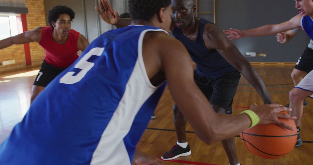 Diverse male basketball team and coach playing match - Free Images, Stock Photos and Pictures on Pikwizard.com