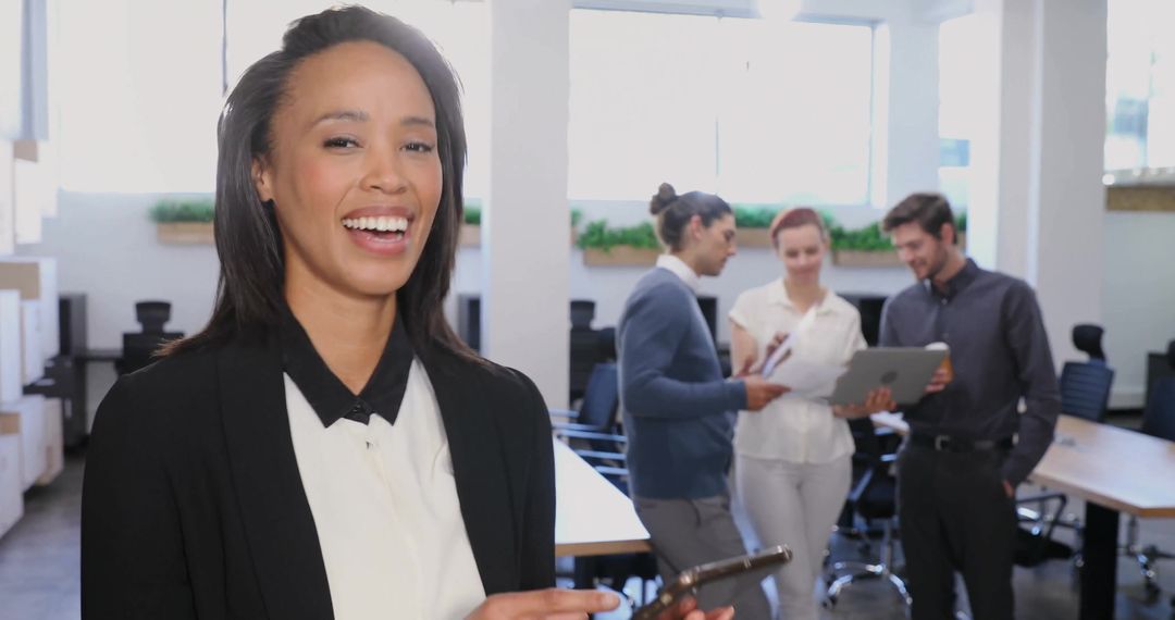 Smiling Professional Working on Smartphone in Modern Office Environment