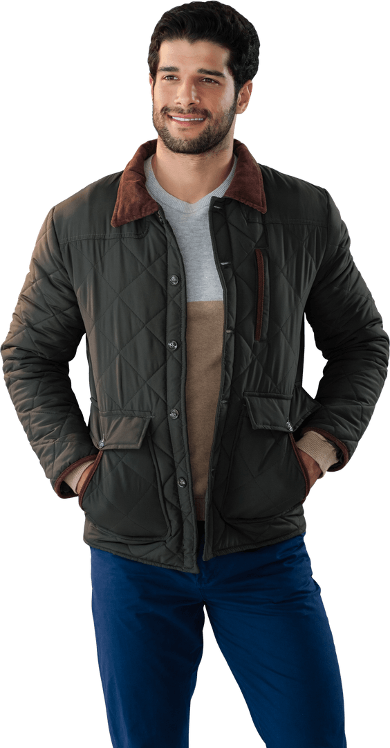 Smiling Man in Quilted Jacket with Hands in Pockets