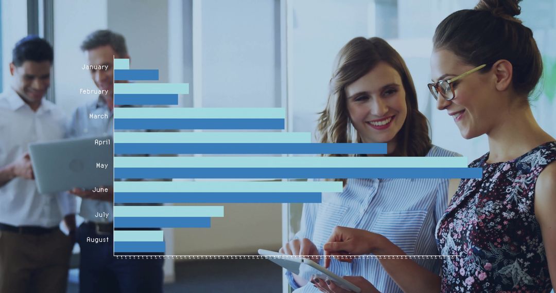 Business Team Analyzing Financial Data on Digital Interface in Office