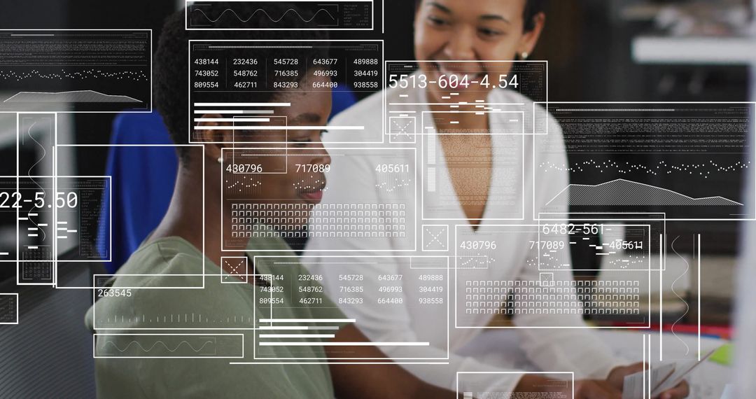 Diverse Colleagues Analyzing Data with High-Tech Panels in Office