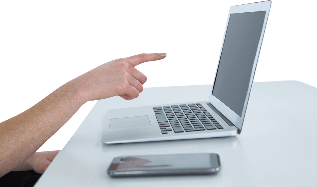 Businesswoman Gesturing at Laptop Screen, Transparent Smartphone in Foreground