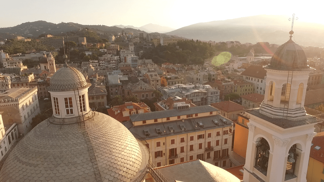 Transparent urban landscape with historic buildings at sunrise