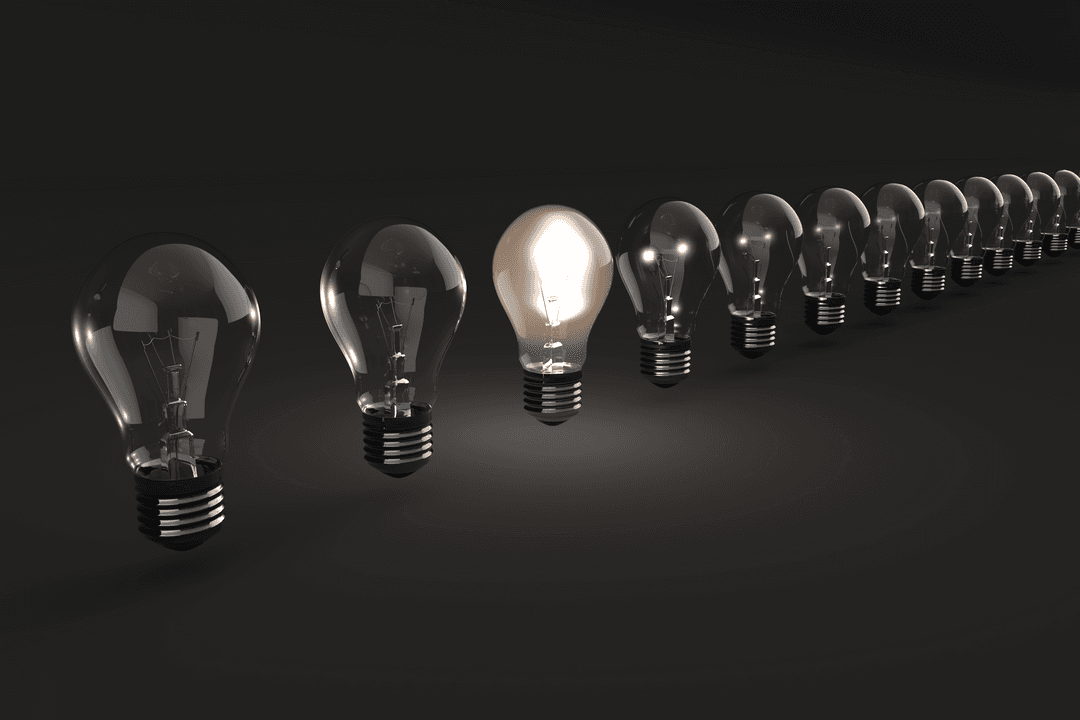 Glowing Light Bulb Demonstrating Ideas on Transparent Background