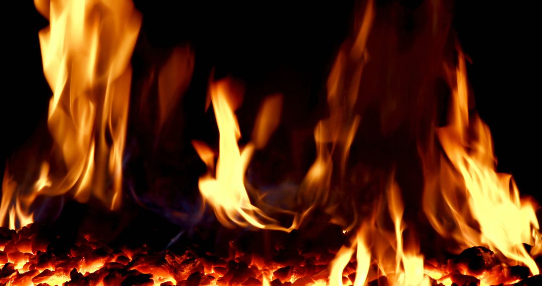 Intense Flames and Glowing Embers in Dark Background - Free Images, Stock Photos and Pictures on Pikwizard.com